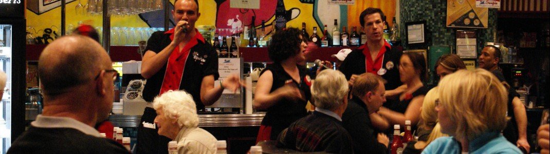 Singing waiters at Ellen's Stardust Diner