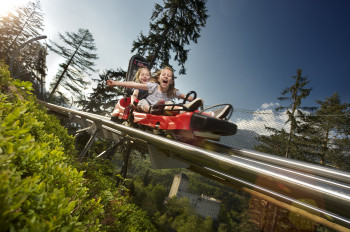 The alpine coaster Osttirodler in Lienz makes for thrilling rides and breathtaking experiences.