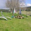 Liegewiese mit Grillplatz und Spielplatz