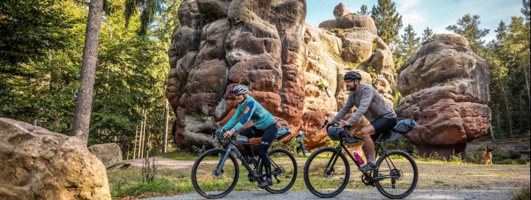 Along the RockHead route, cyclists pass the impressive Kelchsteine in the Zittau Mountains, one of the striking rock formations that give the route its name.