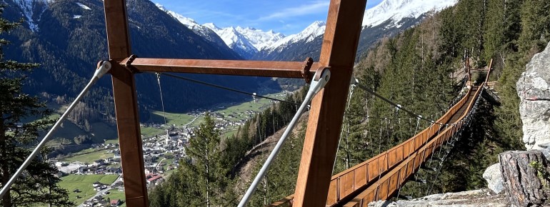 The view from the suspension bridge on the Sunnenseit'n Weg over the Stubai Valley.