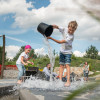 Abkühlung auf dem Wasserspielplatz Aqua Plantscha