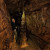 Entlang des fossilen Flusses erwarten die Besucher der Binghöhle imposante Tropfsteingebilde.
