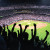 Fans der Colorado Rockies bejubeln ihr Baseball-Team in Coors Field.