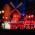Die rote Windmühle prägt die Außenansicht des Moulin Rouge.