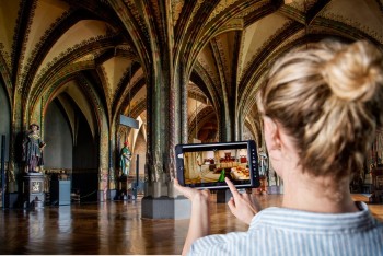 Magnificent vaults, historic murals, and ornate staircases make the interior spaces an architectural experience.