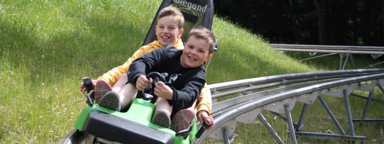 Safely secured on rails and strapped in, you'll race through twists, turns and fun rolling waves.