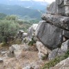 A wall underneath the falling rocks of Pan