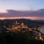 Illuminated at night: the castle palace towers impressively over the Danube.