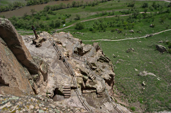 The cave site is located inside the face of a rock.