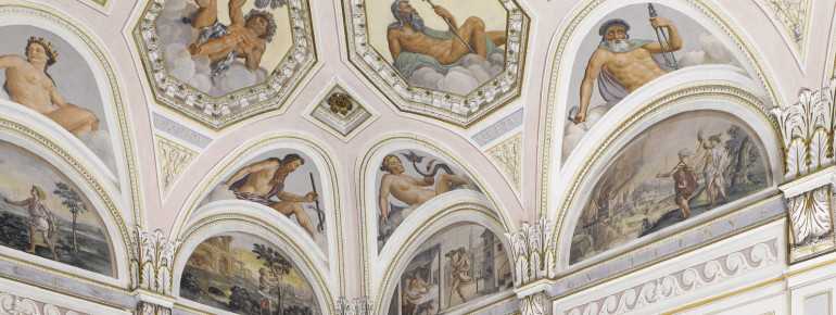 In the Hall of the Gods, the numerous ceiling paintings can be admired by visitors