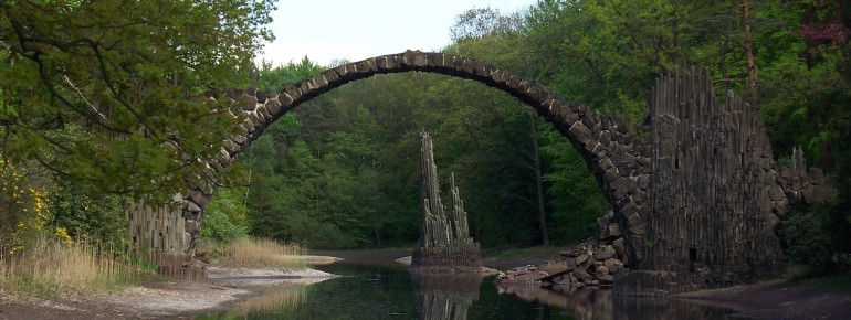 The Devil's Bridge forms a perfect circle with its reflection in the water.