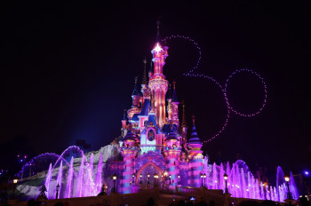 Every evening, the attractions at Disneyland are colourfully illuminated.