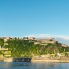 From the banks of the Rhine, you can gaze upon the mighty Ehrenbreitstein Fortress.