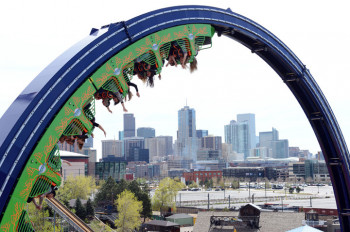 Tourists riding the Brain Drain at Elitch Gardens Theme & Water Park.