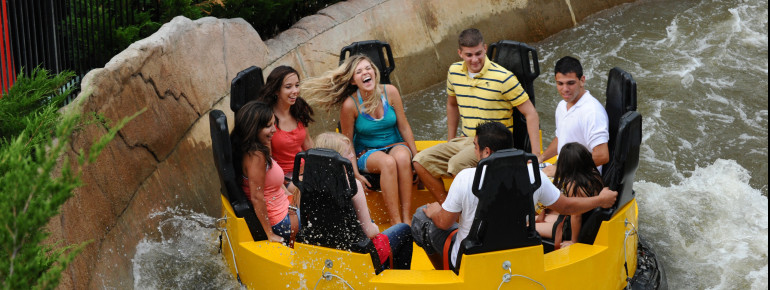 Tourists riding Disaster Canyon at Elitch Gardens Theme & Water Park.