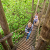 On the JungleTour, kids climb over exciting suspension bridges and high climbing towers.