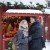 A couple enjoying their time at the snowy Gamla Stan Christmas Market