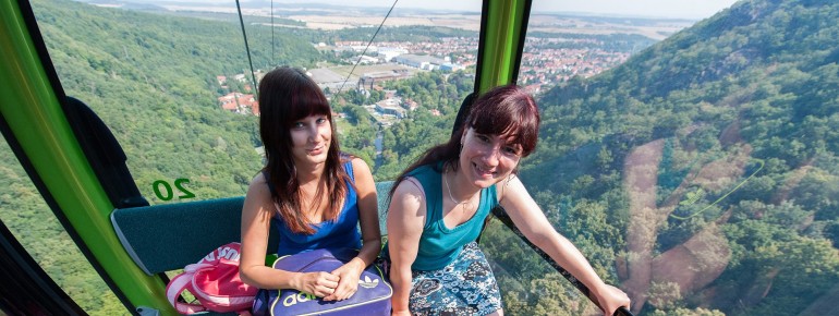 View into the green gondola with glass floor and view into the Bode Valley.