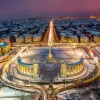 View of the illuminated Heroes’ Square at night.