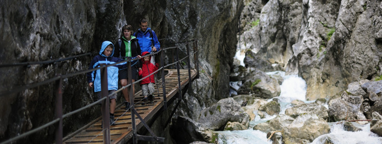 You should wear sturdy shoes and rain clothes.