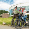 Cyclists with a ranger in front of the national park centre.