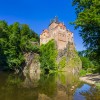 Inside the castle, visitors can explore rooms that have been preserved in their original medieval state.