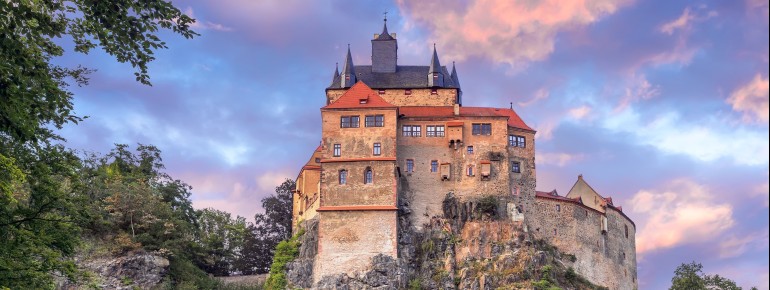 Kriebstein Castle sits impressively on a rocky outcrop above the Zschopau River.