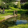 The Lauter spring is nestled in a well-maintained park right next to the historic monastery walls.