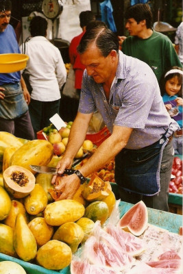 A fruit salesman at Mercado Central