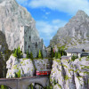 The model railway also goes through the Swiss Alps.