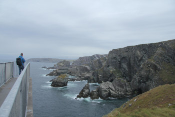 Mizen Head stretches dramatically into the foaming, wild Atlantic with its sea cliffs.