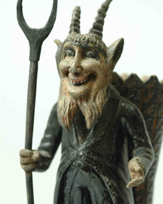 Sculpture depicting a devil