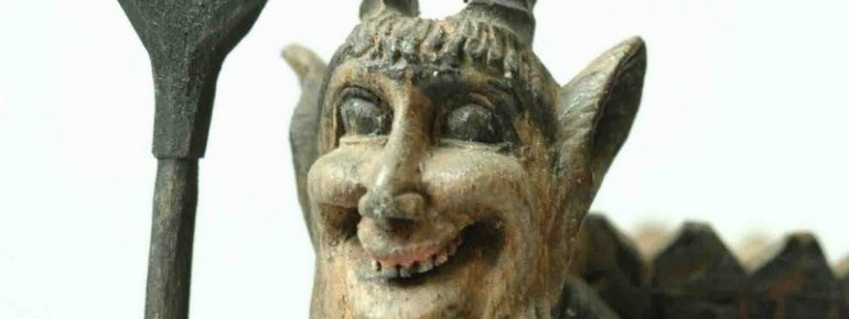 Sculpture depicting a devil