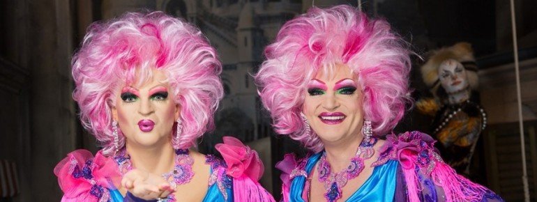 German drag artist Olivia Jones next to her wax figure.