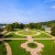 The extensive park invites visitors to stroll around and enjoy its artistic garden architecture and old trees.