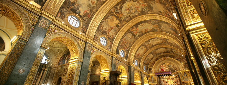 Carvings and tapestries show scenes from the live of St. John.