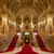 The magnificent staircase inside the parliament building impresses with its golden decorations, red carpets and neo-Gothic décor.
