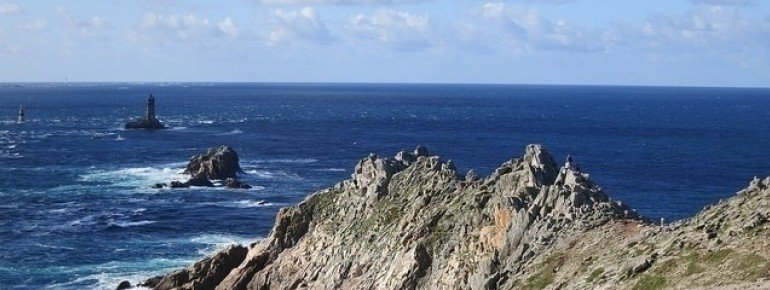 Rough cliffs form the western tip of France
