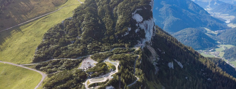 Embark on an exciting journey into prehistoric times with a fantastic mountain backdrop.