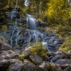 The Zweribach plunges several meters into the depths, creating a stunning natural spectacle.