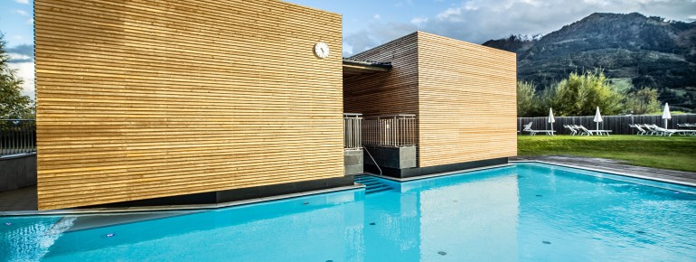 There is an outdoor pool in the sauna world.