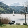 Segelboote sind einige unterwegs auf dem Großen Alpsee bei Immenstadt.