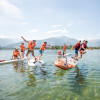 Nicht nur Erwachsene auch Kinder lieben das Stand-up-Paddeling auf dem Zeller See.