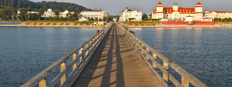 Binz's historic pier is the landmark of the Baltic seaside resort and leads far out into the Baltic Sea.