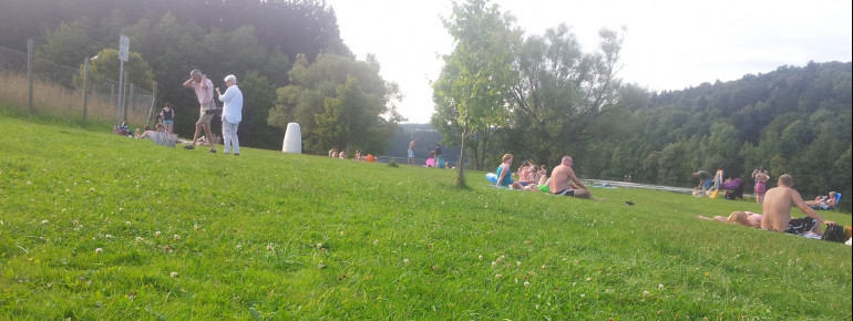 Visitors enjoying themselves by the reservoir