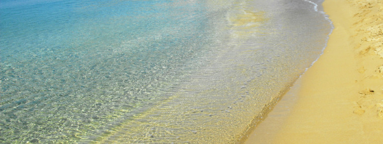 The flat beach is ideal for families.